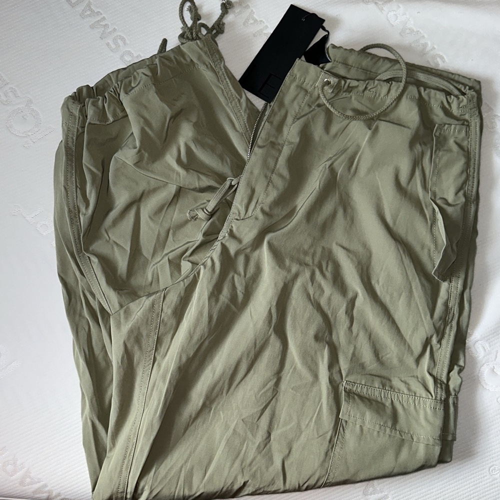 Brand new local European ( Le Parachute pant) in the color sage size M/L